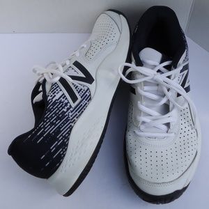 SIZE 11.5. New Balance men's white leather shoes.